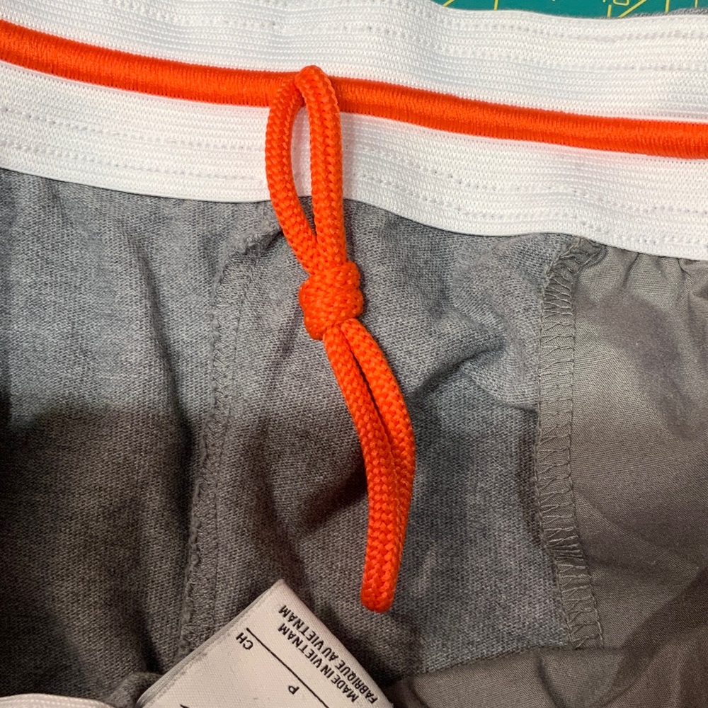 Nike Men’s Gray Athletic Shorts with Orange Swoosh - Picture 7 of 9